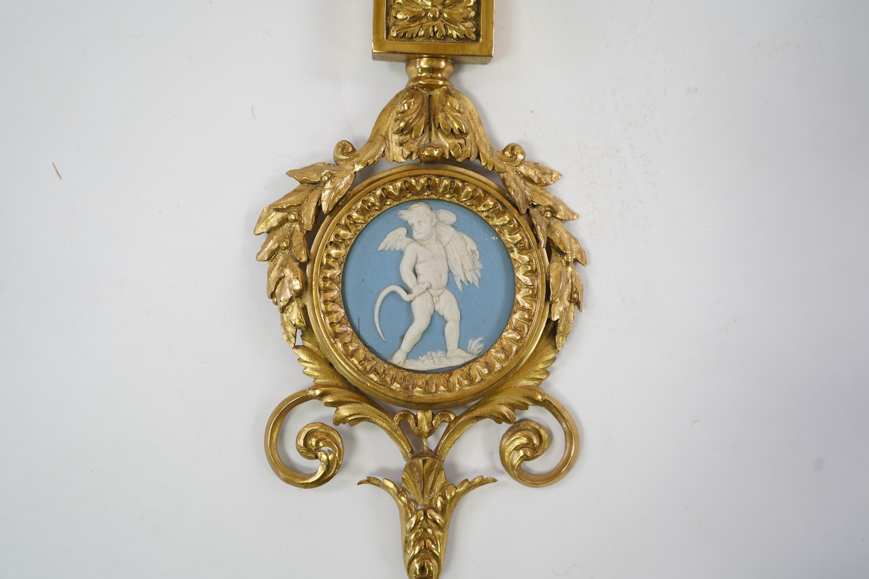 A set of four Adam style ormolu and jasper ware mounted wall appliques, early 20th century